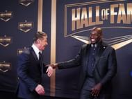 Titus O'Neil and Vince McMahon recreating their controversial moment from 2016